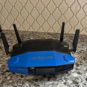 Linksys Blue and Black Wireless Router preowned